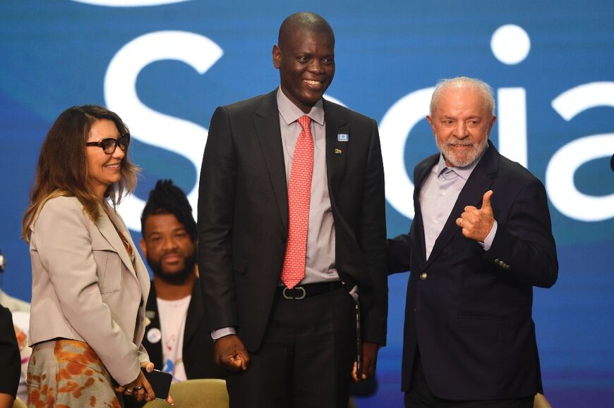 South African Foreign Minister Robert Lamola (C) attended the G20 Social event preceding the summit alongside Brazilian President Luiz Inacio Lula da Silva