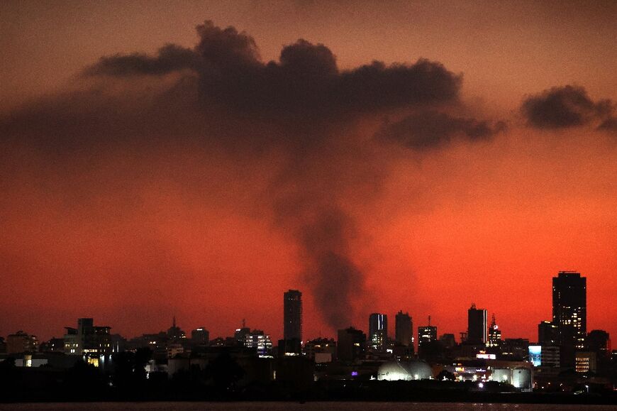 Smoke billows over south Beirut after an Israeli strike on the Hezbollah stronghold.