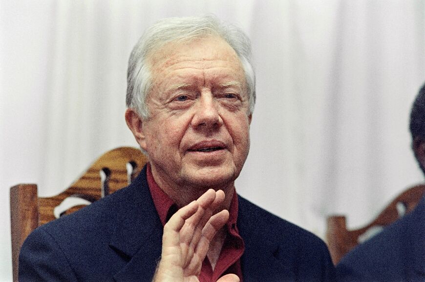 Former US president Jimmy Carter speaks during a trip to Zambia in 1991