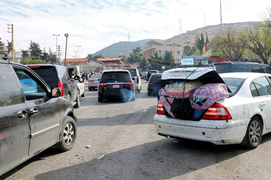 Syrians return to Damascus via Lebanon's Masnaa border crossing -- millions fled abroad during the civil war under Assad