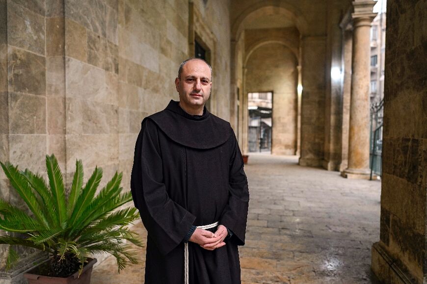 Father Bahjat, a priest at Aleppo's Latin cathedral, says he is hopeful Christians and Muslims can coexist under the rule of the Islamist-led rebels.