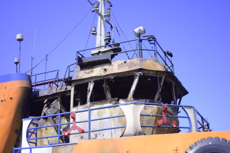 A damaged vessel in the Huthi rebel-controlled port of Hodeida, Yemen, after Israeli air strikes that followed a rebel missile strike against Tel Aviv