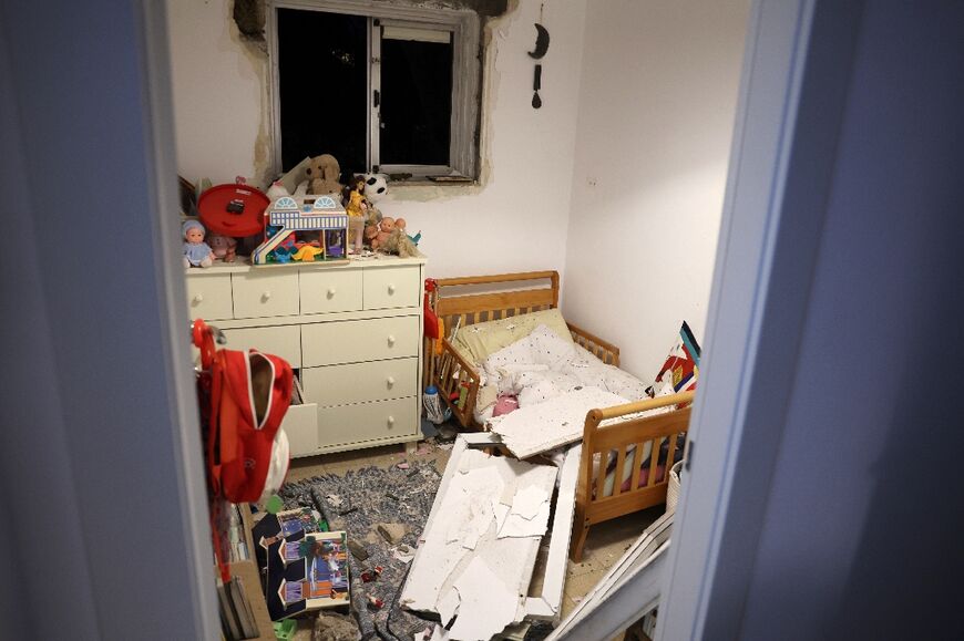 Debris in a bedroom in Tel Aviv on December 21, 2024, after a projectile fired from Yemen landed near the building