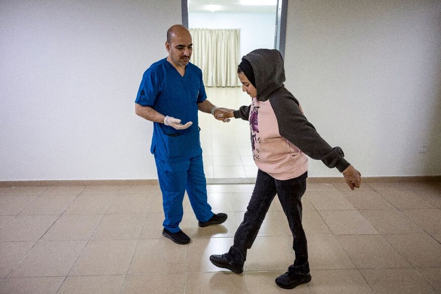 A Palestinian amputee learning to walk again