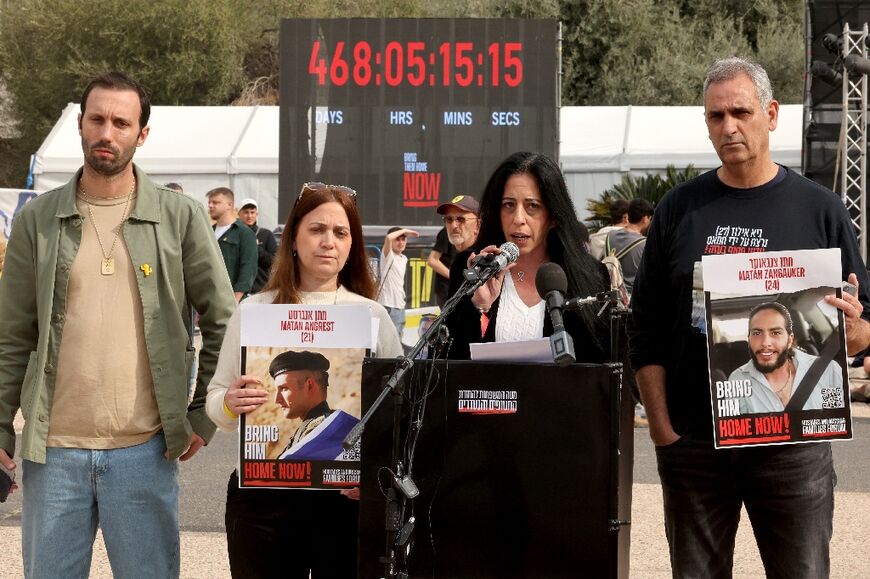 Family members of Israeli hostages taken captive by Palestinian militants in the Gaza Strip deliver a statement to the media in Tel Aviv, ahead of a ceasefire and hostage release deal