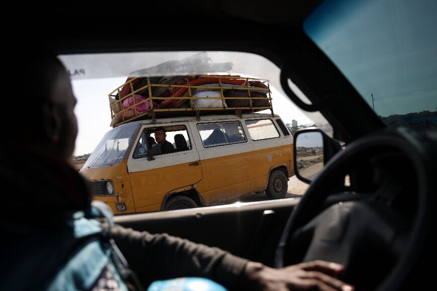 Vehicles loaded with families' possessions plied Gaza's roads Sunday as people returned to their homes