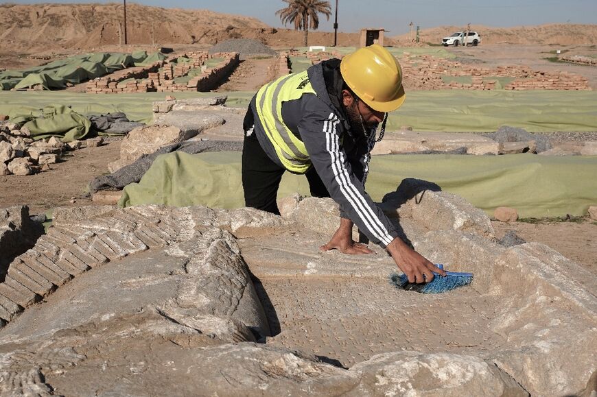 Archaeologists have been carefully reassembling bas-reliefs, sculptures and decorated slabs from an ancient Assyrian palace