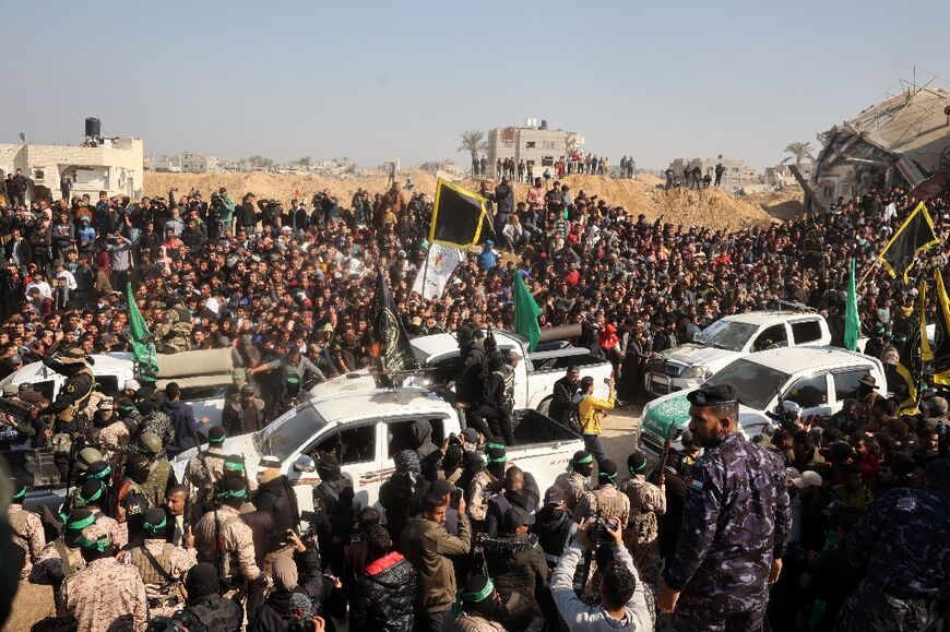 Crowds surge near the family home of slain Hamas leader Yahya Sinwar in Khan Yunis ahead of the hostage handover