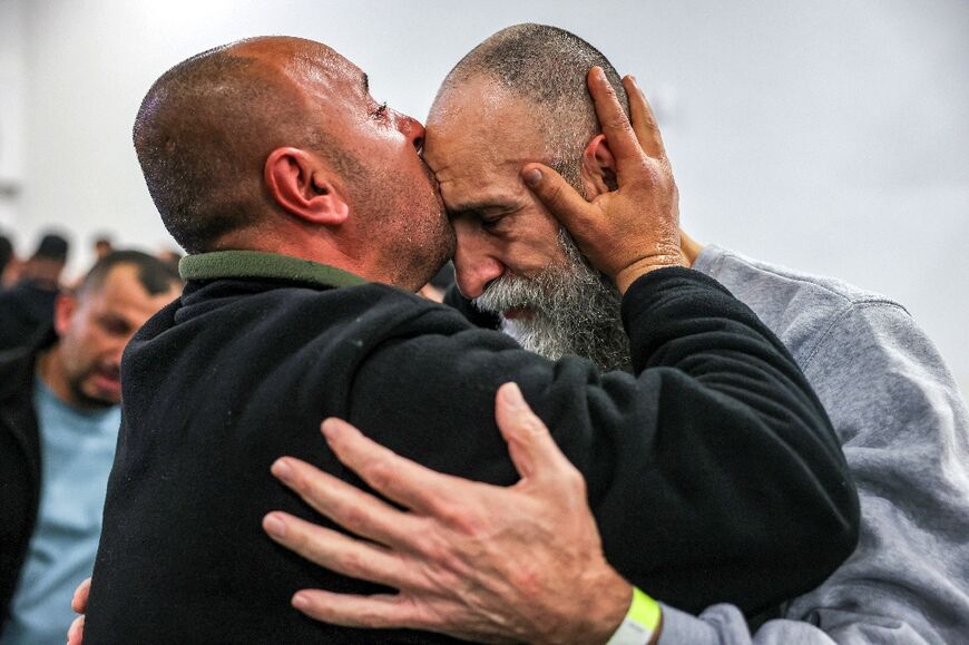 Former Palestinian prisoner Raed Al-Saadi (right), 56, after his release from Israeli jail