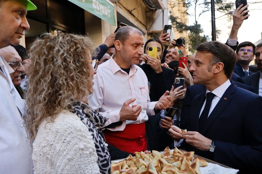 Macron strolled along the lively Beirut neighbourhood of Gemmayzeh a few blocs back from the coastal city's port