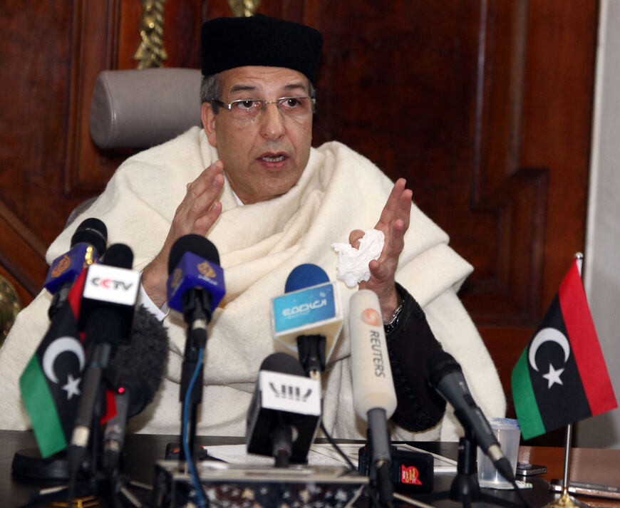 Libyan Central Bank Governor Al-Seddiq Omar al-Kabir speaks during a news conference in Tripoli on January 13, 2012. Kabir denied receiving roughly 20 billion USD in assets that were held overseas by Moamer Kadhafi's regime and frozen during the conflict that ousted him. AFP PHOTO/MAHMUD TURKIA (Photo by Mahmud TURKIA / AFP) (Photo by MAHMUD TURKIA/AFP via Getty Images)