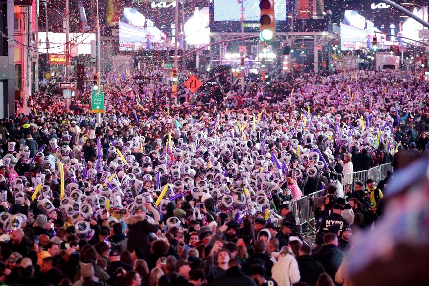 Tens of thousands of revellers crammed into New York's Times Square