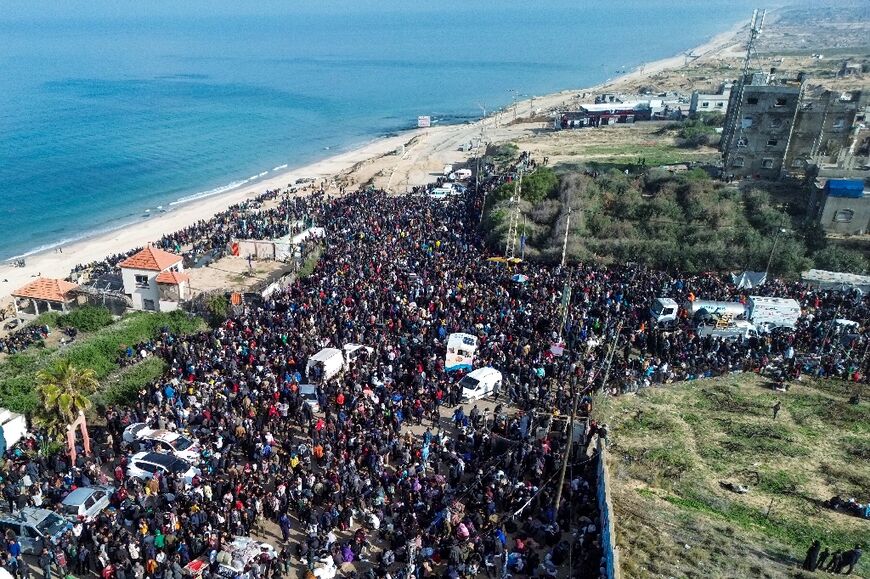 An aerial photo shows displaced Gazans gathering in Nuseirat, with the crossing to northern Gaza blocked in a dispute between Hamas and Israel