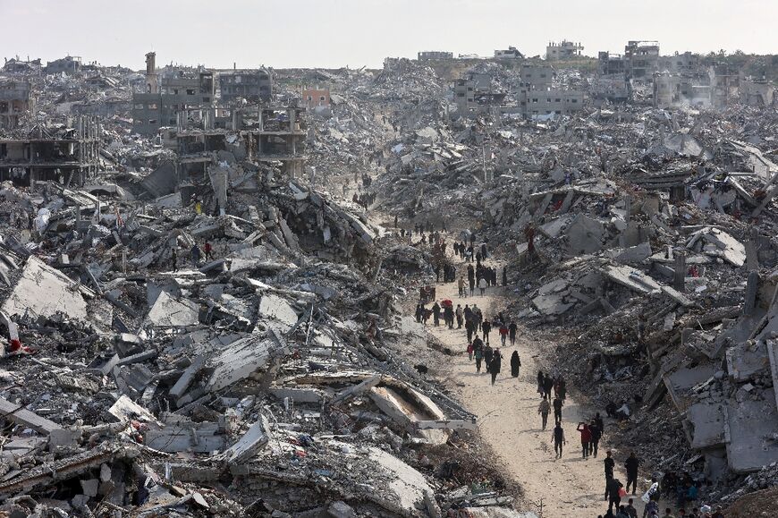 In the northern area of Jabalia, hundreds headed back to an apocalyptic landscape piled with rubble and destroyed buildings