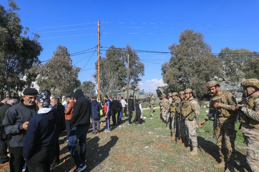 Lebanese army soldiers deploy to prevent residents of the southern Lebanese village of Mais al-Jabal from returning -- a resident said Israeli troops had opened fire on civilians in the area