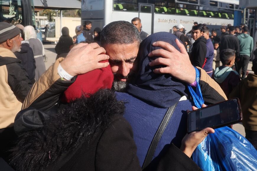 A former Palestinian prisoner is welcomed by friends and relatives upon arriving at the European Hospital in Khan Yunis