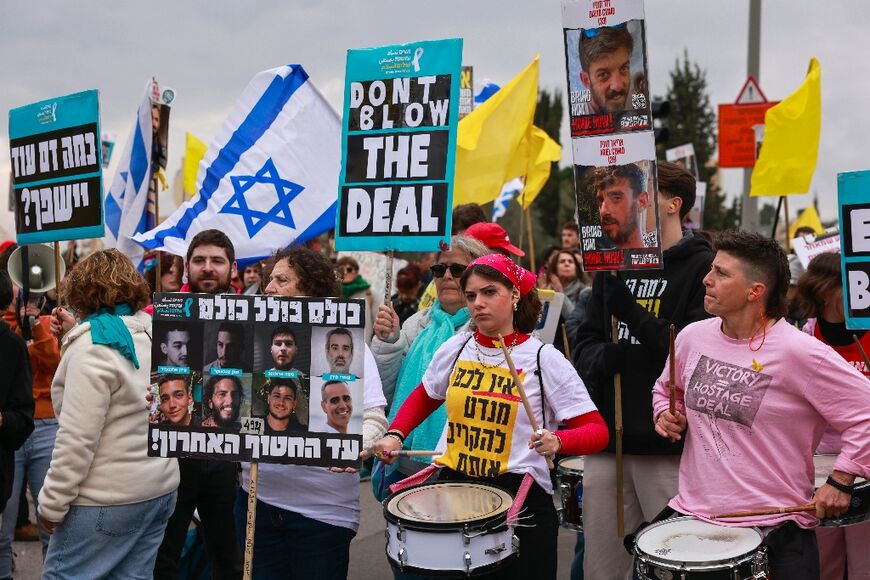 Israelis rally outside Prime Minister Benjamin Netanyahu's office in Jerusalem, calling to complete the hostage deal