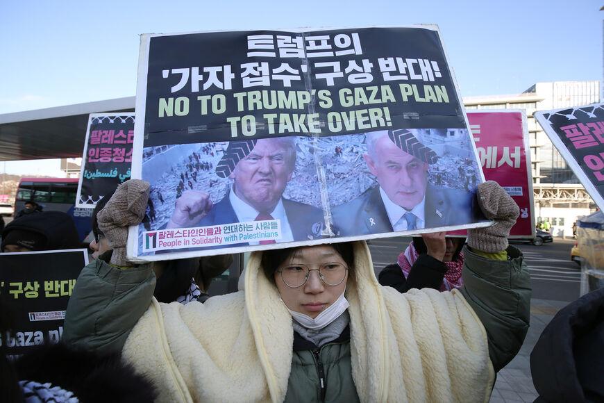 SEOUL, SOUTH KOREA - FEBRUARY 05: Activists participate in a rally against Trump near the U.S. embassy on February 05, 2025 in Seoul, South Korea. US President Donald Trump has said the US will take over after resettling Palestinians elsewhere under an extraordinary redevelopment plan that he claimed could turn the enclave into the riviera of the Middle East. (Photo by Chung Sung-Jun/Getty Images)