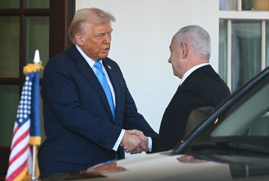 US President Donald Trump greets Israel's Prime Minister Benjamin Netanyahu as he arrives at the North Portico of the White House in Washington, DC, on February 4, 2025.