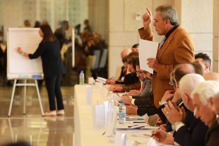 An image shared by Syrian state media shows representatives at a workshop during the national dialogue conference