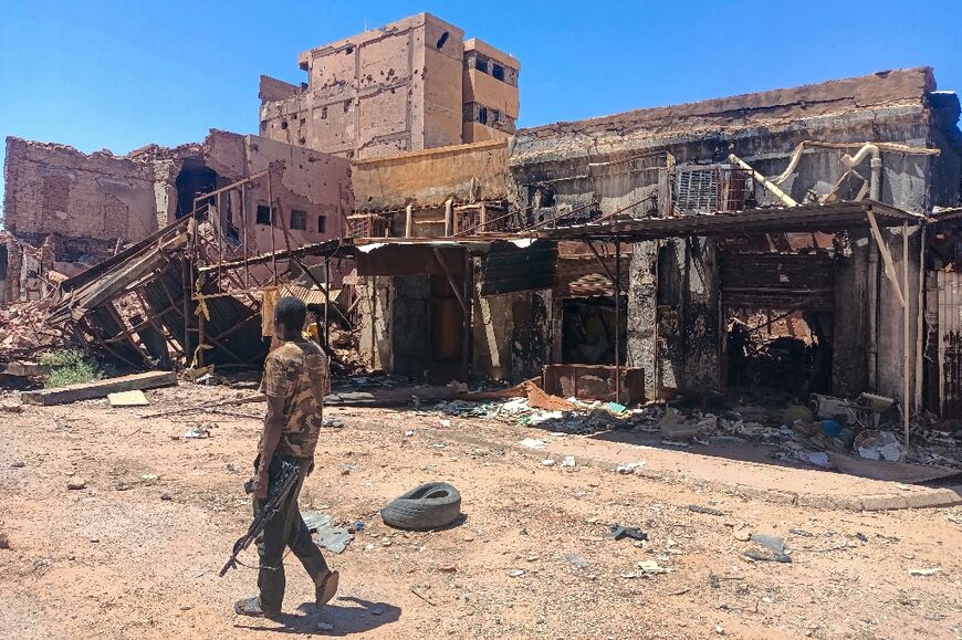 A fighter loyal to the army in Khartoum after government forces retook the Sudanese capital