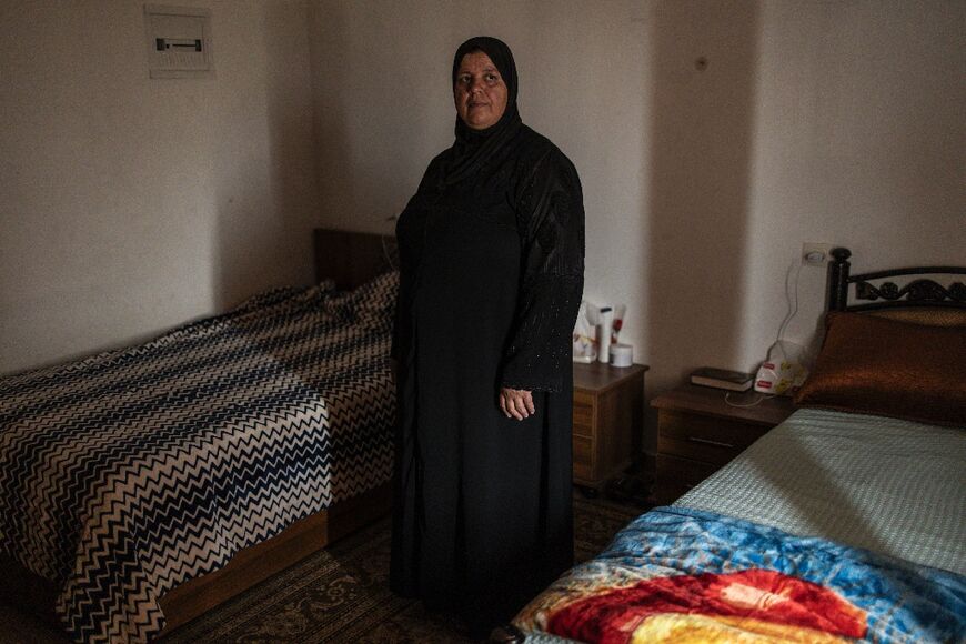 'We have 20 percent of the life we had' in Jenin refugee camp, Umm Majd, 53, says in the two-person dorm room she shares with three others