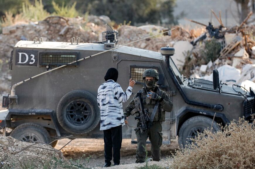 Israeli troops arrived to move the mourners on from the cemetery