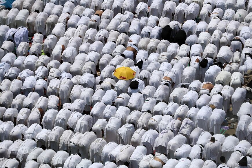 Muslim worshippers, pray at Namirah mosque near Mount Arafat