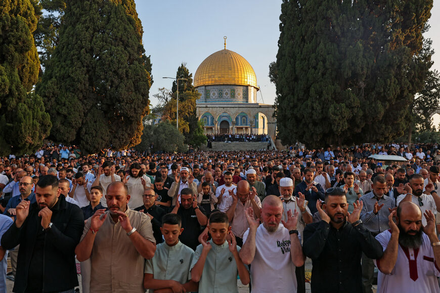 Muslims perform a special morning prayer on the first day of the Eid al-Adha festival, which marks the end of the Hajj pilgrimage to Mecca, at the Al-Aqsa Mosque compound in Jerusalem's Old City on June 6, 2025. (Photo by AHMAD GHARABLI / AFP) (Photo by AHMAD GHARABLI/AFP via Getty Images)