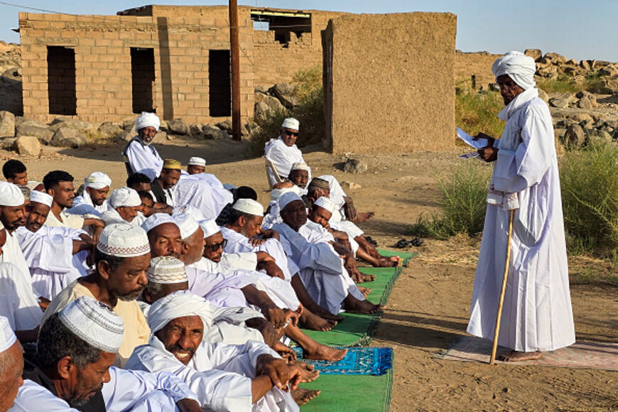 Muslim worshippers attend the sermon after the early morning prayers for Eid al-Adha, the feast of sacrifice, in Ashishi island in the Meroe district of northern Sudan on June 6, 2025. (Photo by AFP) (Photo by -/AFP via Getty Images)