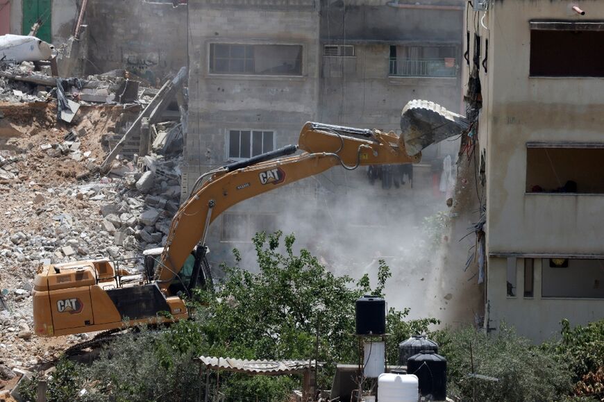 Homes were knocked down and wide avenues cleared
