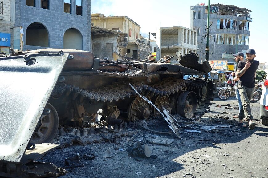 Local Druze fighters were conducting search operations across the city after the withdrawal of government forces