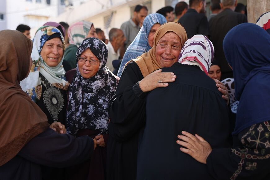 Gaza's civil defence agency said at least 12 people were killed in the Israeli strike on the school