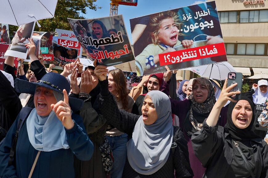 Protesters near the Egyptian embassy in Tel Aviv calling to open land crossing and allow aid into Gaza