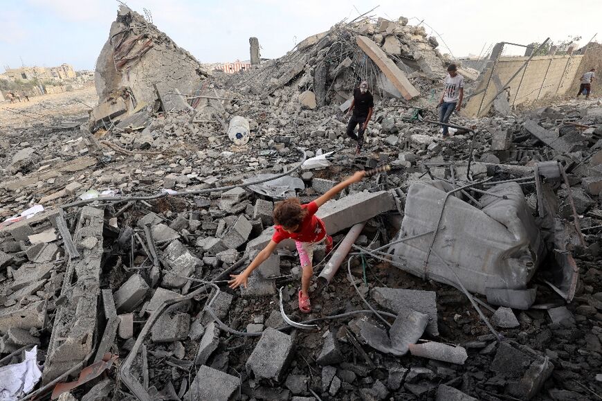 Gaza's civil defence agency said 52 were killed in a wave of Israeli airstrikes, shelling and shooting on Thursday
