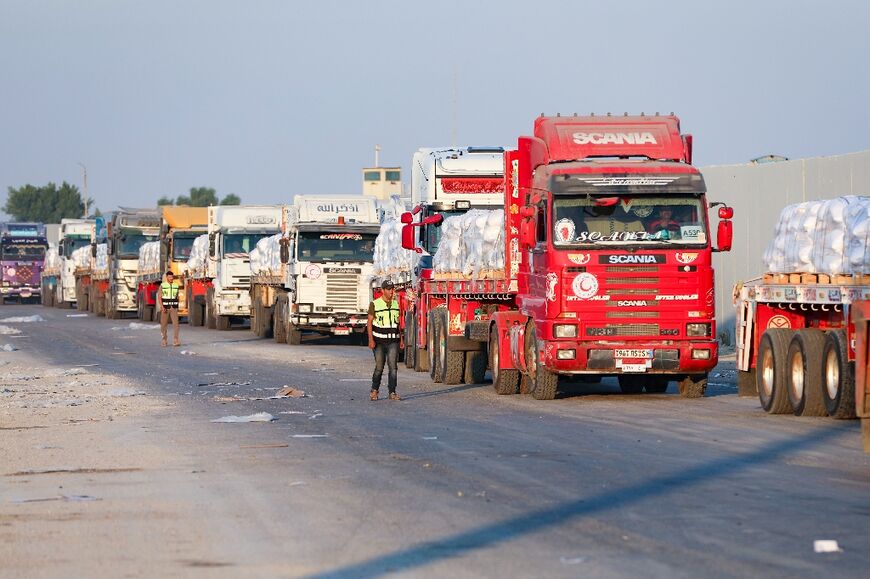 Trucks have begun to arrive at Israel's border crossings into Gaza but aid agencies complain of delays to authorisations and Israel accuses the UN of failing to move quickly enough to distribute the deliveries 