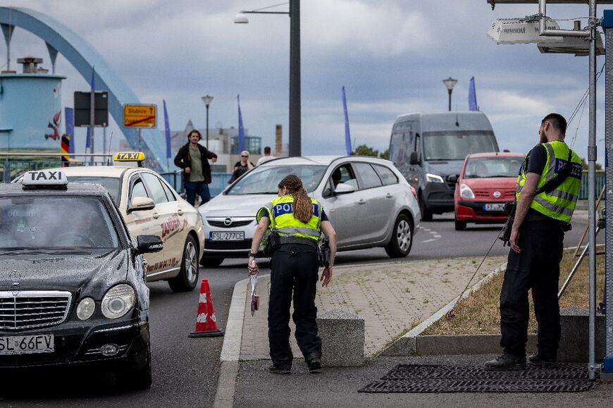 German police check cars at the Polish-German border in Frankfurt an der Oder, eastern Germany, on July 7, 2025