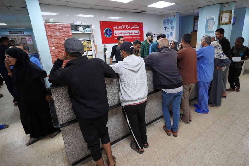 Palestinians line up for care at the European hospital in Khan Yunis in the southern Gaza Strip in May 2024 Palestinians line up for care at the European hospital in Khan Yunis in the southern Gaza Strip in May 2024