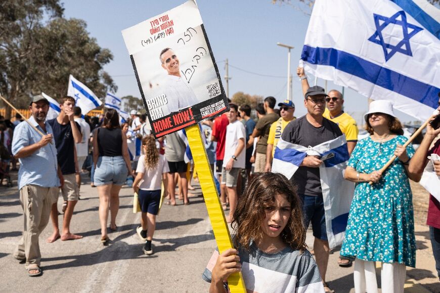 Crowds gathering for the arrival of Israeli-Hungarian former hostage Omri Miran, returned by Hamas Crowds gathering for the arrival of Israeli-Hungarian former hostage Omri Miran, returned by Hamas
