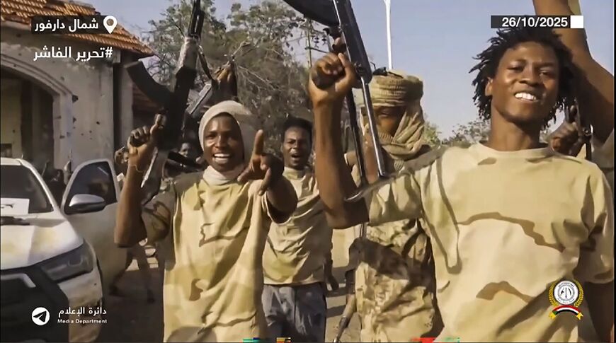 An image taken from handout video footage released by Sudan's paramilitary Rapid Support Forces showign its RSF fighters celebrating in the streets of El-Fasher after an 18-month siege An image taken from handout video footage released by Sudan's paramilitary Rapid Support Forces showign its RSF fighters celebrating in the streets of El-Fasher after an 18-month siege