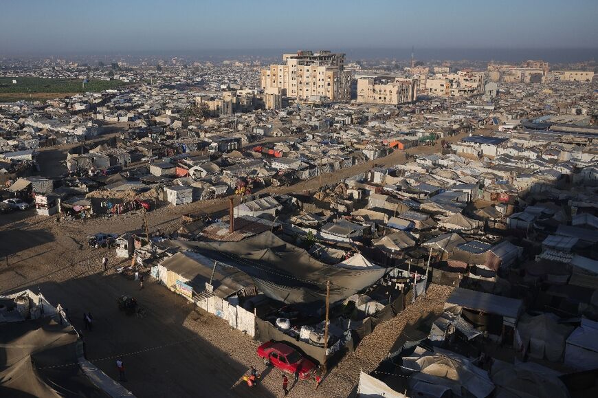 Much of Gaza lies in runs, leaving hundreds of thousands of families living in makeshift displacement camps like this one in Khan Yunis in the south of the territory Much of Gaza lies in runs, leaving hundreds of thousands of families living in makeshift displacement camps like this one in Khan Yunis in the south of the territory