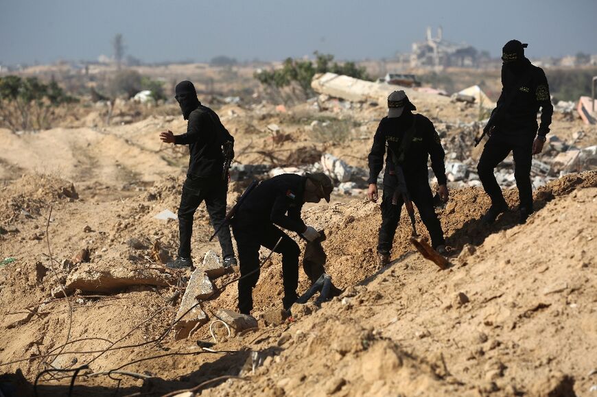 Masked gunmen from Islamic Jihad searching in Nuseirat on November 21