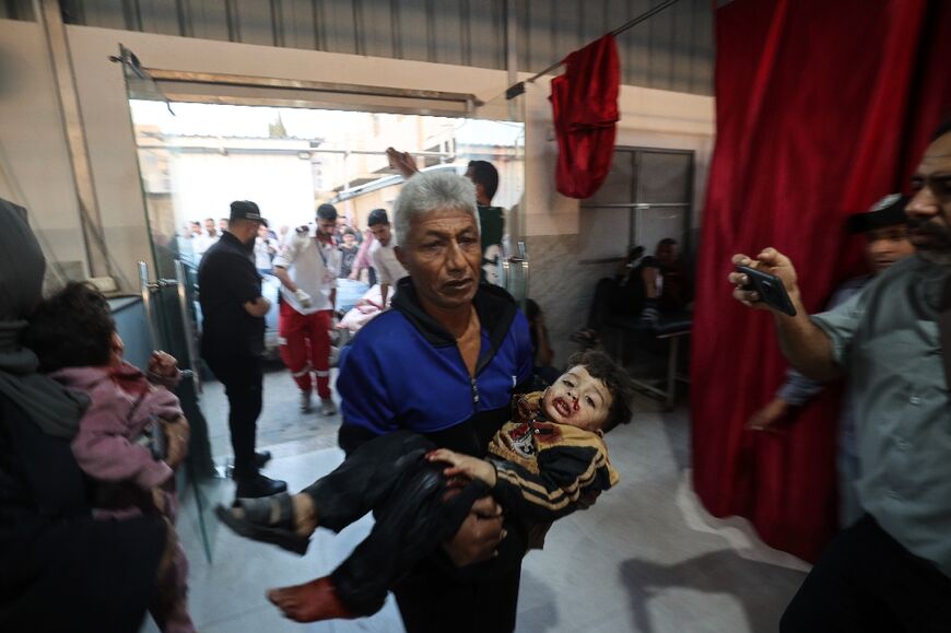 Casualties were brought into Al-Awda Hospital in the central Gaza Strip