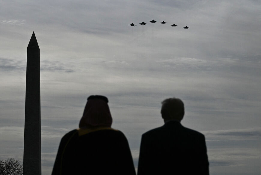 US President Donald Trump (R) and Crown Prince and Prime Minister of the Kingdom of Saudi Arabia Mohammed bin Salman watch a flyover of military aircraft on the South Lawn at the White House in Washington, DC on November 18, 2025. Saudi Crown Prince Mohammed bin Salman arrived at the White House to fanfare and a jet flyover Tuesday, in his first visit to the United States since the 2018 murder of journalist Jamal Khashoggi. (Photo by Brendan SMIALOWSKI / AFP) (Photo by BRENDAN SMIALOWSKI/AFP via Getty Image