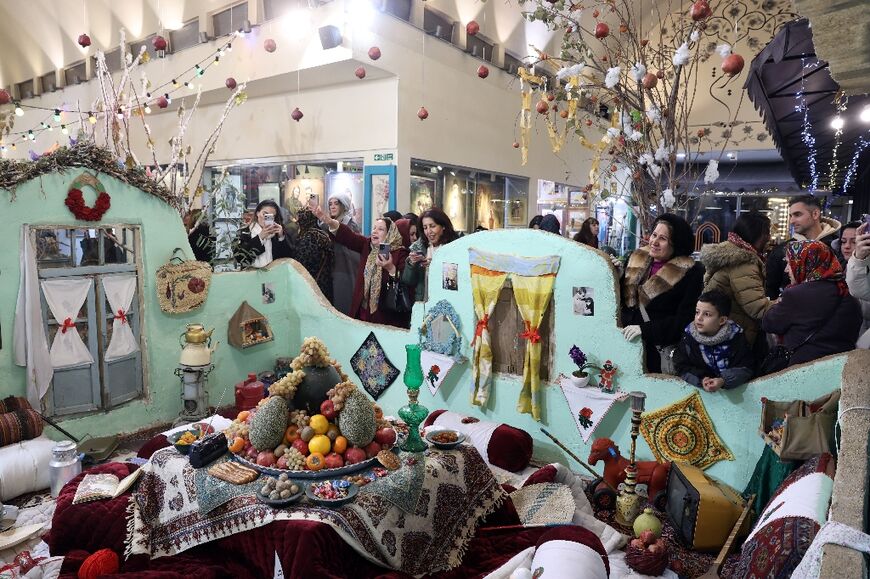 Iranians shop for the Yalda celebrations in northern Tehran