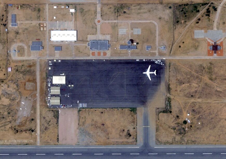 This handout satellite image from 2025 Planet Labs PBC shows the Amdjarass airbase in Chad on August 30, 2023, with an Ilyushin Il-76D aircraft reportedly used to transport weapons and mercenaries to Sudan, according to sources