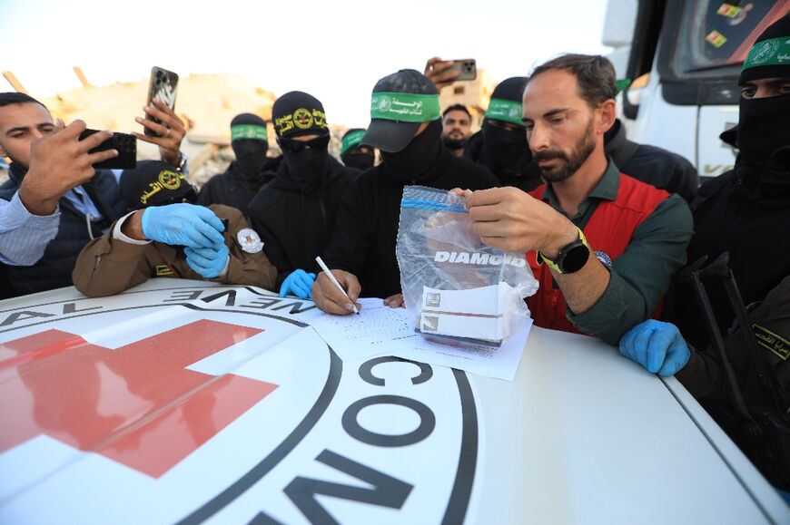 Palestinian militants hand the remains over to the Red Cross which then passes them on to Israeli forces