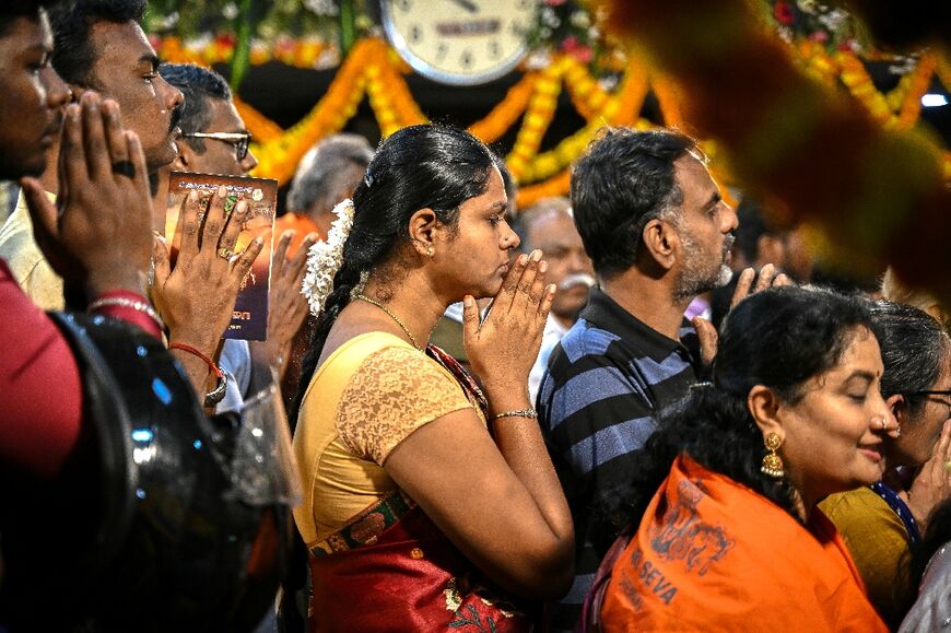 Hindu devotees offer prayers on New Year's Day at a temple in Chennai on January 1, 2026
