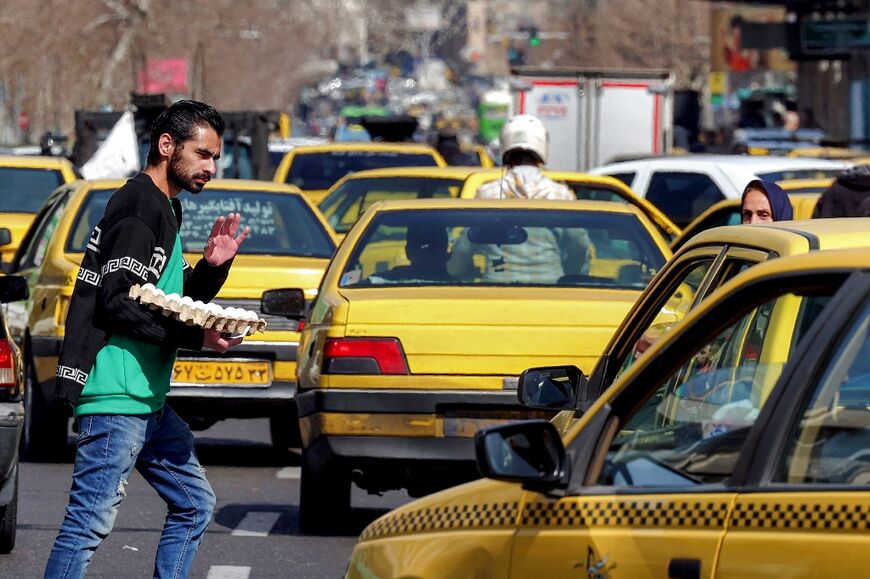 Daily life continues in Tehran, even as some residents prepare for the worst 