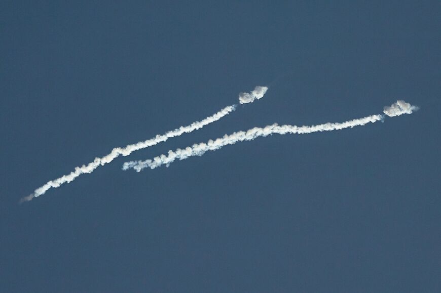 Smoke from a reported rocket interception is seen in the sky over Abu Dhabi 
